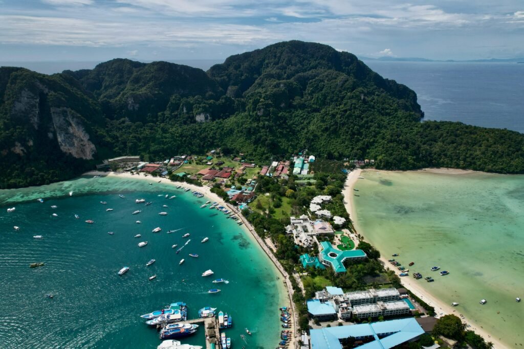 A breathtaking aerial shot of a tropical island with lush greenery and turquoise waters, perfect for travel lovers.